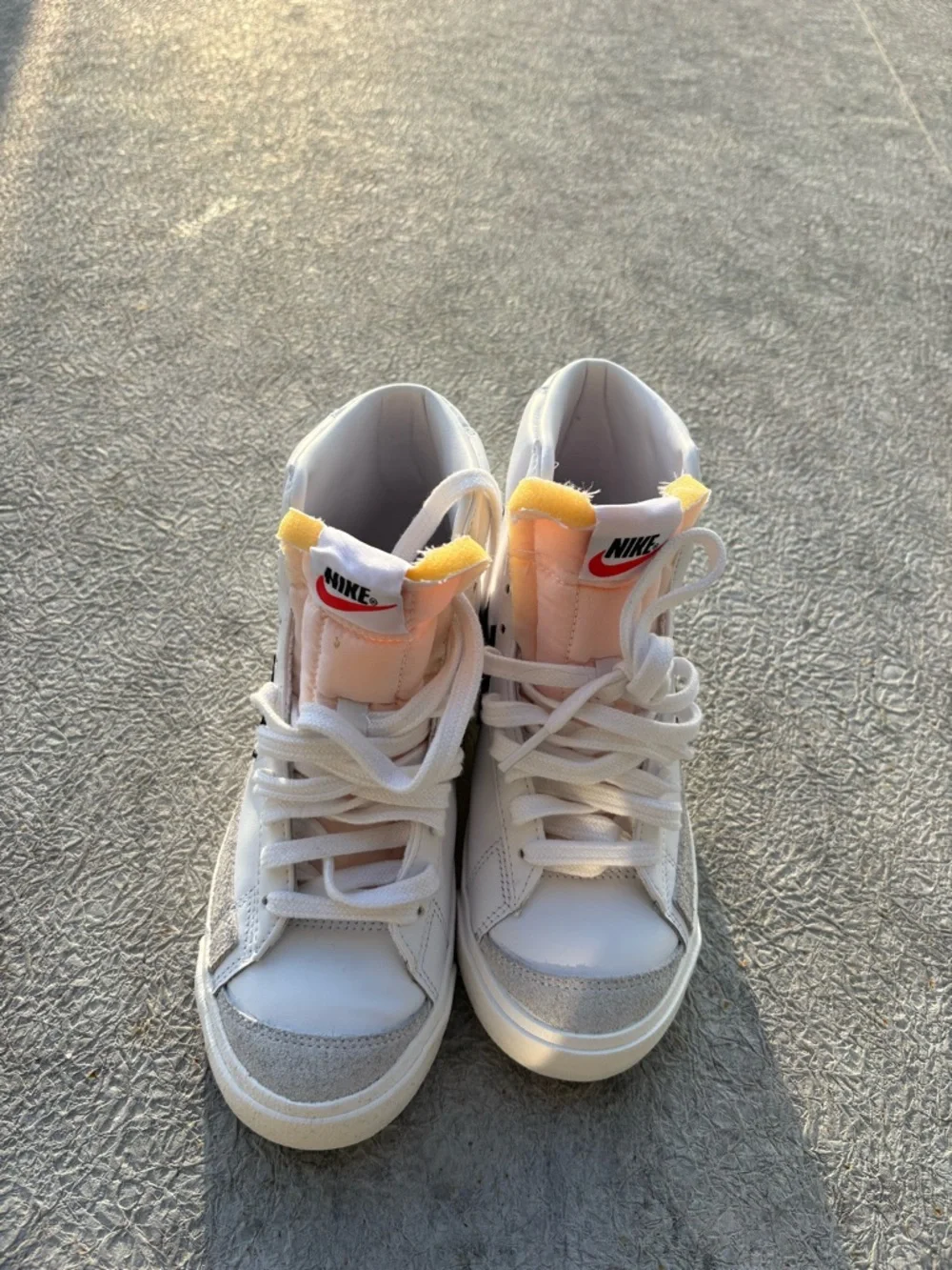 Nike White High-Top Sneakers with Black Swoosh - Picture 2 of 4